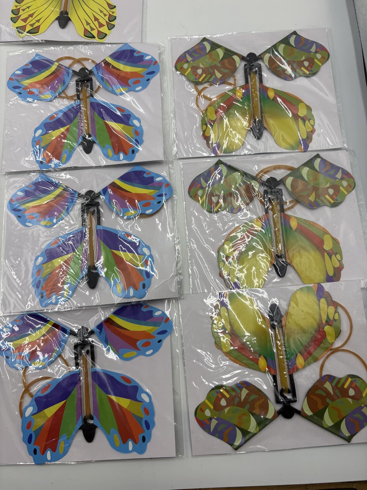 Lot of 15 Magic Flyer Butterfly Wind Up Flying Prank Toys New