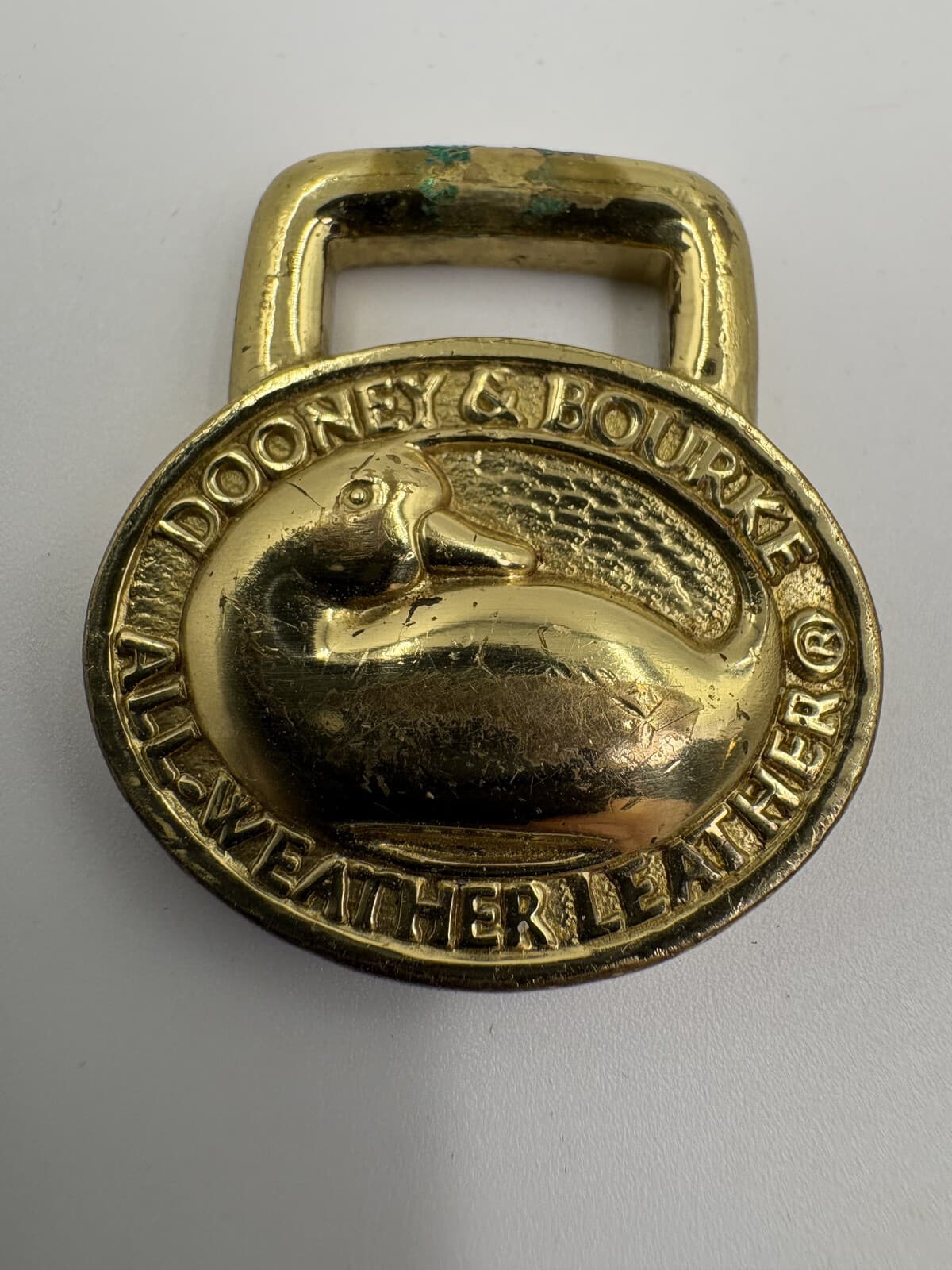 Vintage Dooney & Bourke All Weather Leather Brass Duck Fob Medallion
